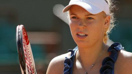 La N.1 mondiale Caroline Wozniacki, charme et efficacité