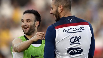 Mathieu Valbuena et Karim Benzema durant le Mondial 2014 (FRANCK FIFE / AFP)