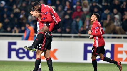 La joie des joueurs de Manchester. Ibrahimovic en tête ! (SERGEI SUPINSKY / AFP)