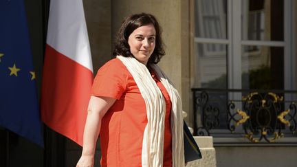 La ministre du Logement, Emmanuelle Cosse, à la sortie de l'Elysée, à Paris, le 19 juillet 2016. (BERTRAND GUAY / AFP)