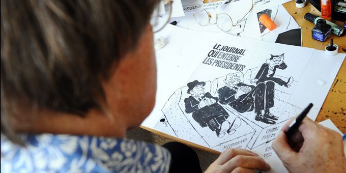 Cabu face au trois derniers chefs de l&#039;Etat dans Charlie Hebdo : &quot;Le journal qui enterre les présidents&quot;
 (MIGUEL MEDINA/AFP)