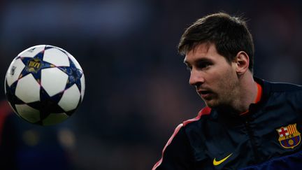 Le footballeur Lionel Messi lors d'un match entre le FC Barcelone et le PSG, le 2 avril 2013 &agrave; Paris.&nbsp; (DEAN MOUHTAROUPOULOS / GETTY IMAGES)