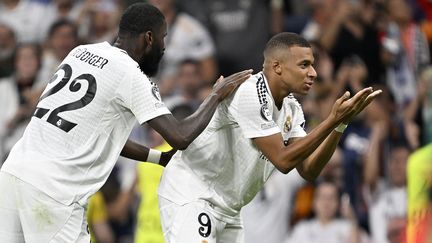 Kylian Mbappé célèbre son but avec le Real Madrid contre Stuttgart en Ligue des champions, le 17 septembre 2024. (BURAK AKBULUT / AFP)