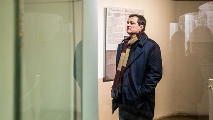 Le maire RN de Perpignan (Pyrénées-Orientales), dans un musée de la ville, le 9 février 2021.&nbsp; (JEAN-CHRISTOPHE MILHET / HANS LUCAS / AFP)