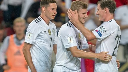 Les Allemands euphoriques lors de leur succès face à la Norvège en éliminatoires du Mondial 2018. (DANIEL MAURER / DPA)