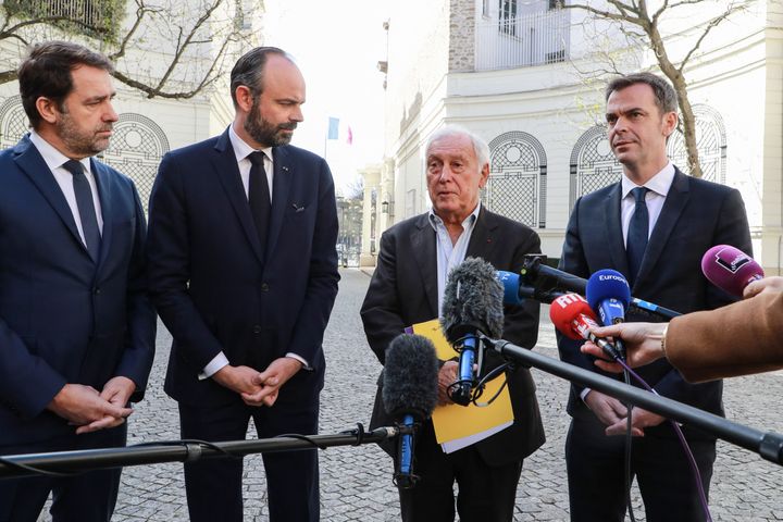 Christophe Castaner, ministre de l'Intérieur, Édouard Philippe, Premier ministre, Jean-François Delfraissy, président du conseil scientifique, et Olivier Véran, ministre de la Santé, le 13 mars 2020. (LUDOVIC MARIN / AFP)