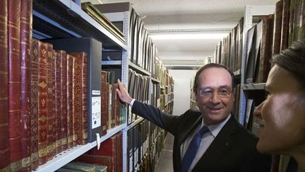 François Hollande inaugure le nouveau site des Archives Nationales de Pierrefitte-sur-Seine en compagnie de la ministre de la Culture Aurélie Filippetti.
 (Michel Euler / AFP)