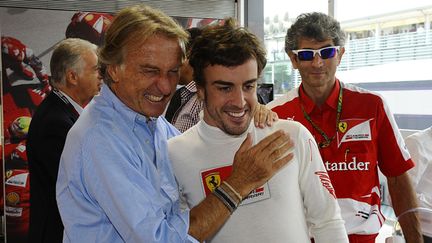 Le président de Ferrari Luca di Montezemolo avec son pilote Fernando Alonso (ERIC VARGIOLU / E.V.A.)