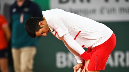 Novak Djokovic en souffrance contre Pablo Carreno-Busta. (ANNE-CHRISTINE POUJOULAT / AFP)