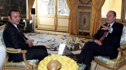 Le roi Mohammed VI et Jacques Chirac à l'Elysée, le 12 mars 2005. (AFP POOL)