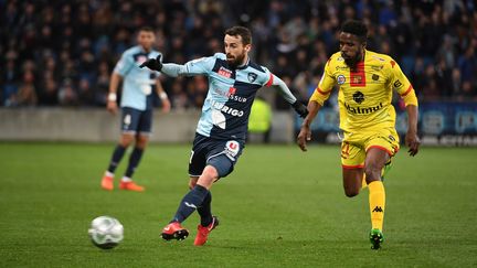 Alexandre Bonnet (Le Havre) face au joueur de Quevilly (EMMANUEL LELAIDIER / MAXPPP)