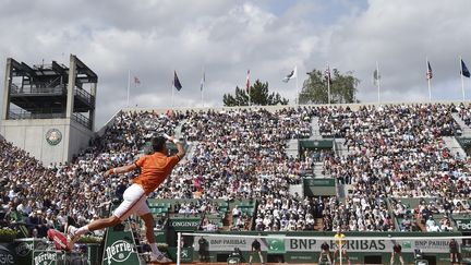 Novak Djokovic face à Gilles Müller (DOMINIQUE FAGET / AFP)