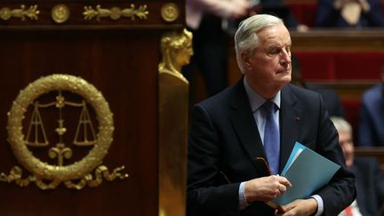 Le Premier ministre Michel Barnier, avant la présentation de sa démission, à l'Assemblée nationale, le 4 décembre 2024. (ALAIN JOCARD / AFP)