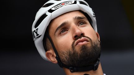 Nacer Bouhanni lors de la présentation des équipes sur le Critérium du Dauphiné, le 9 juin 2019 (ANNE-CHRISTINE POUJOULAT / AFP)