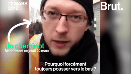 Lors des manifestations du jeudi 22 mars à Paris, un jeune cheminot explique que le gouvernement devrait accorder les mêmes avantages à tout le monde, au lieu de supprimer le statut des cheminots.