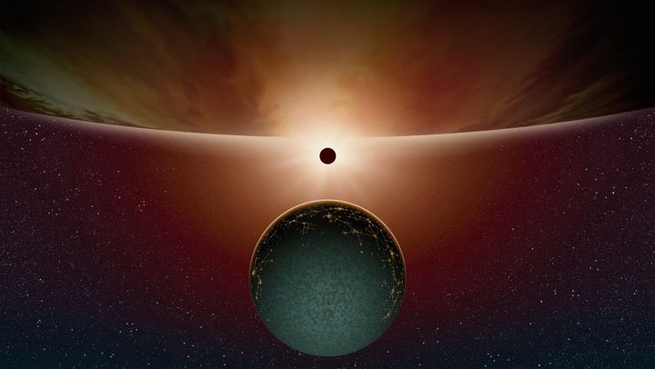 Vue d'artiste : "Eclipse&nbsp;et Exoplanètes". Un satellite d'une planète extrasolaire passe devant son étoile créant ainsi une éclipse totale. Au premier plan, un satellite habité. (Illustration) (MONDOLITHIC STUDIOS / NOVAPIX / LEEMAGE VIA AFP)