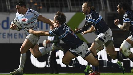 Henry Chavancy échappe aux Montpelliérains. (FRANCK FIFE / AFP)