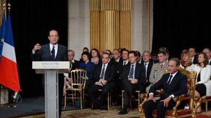 François Hollande à l'Hôtel de Ville mardi 15 mai (PHILIPPE DESMAZES / POOL / AFP)