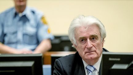 Radovan Karadzic, l'ancien président des Serbes de Bosnie,au tribunal pénal international pour l'ex-Yougoslavie de La Haye (Pays-Bas), le 24 mars 2016. (ROBIN VAN LONKHUIJSEN / AFP)