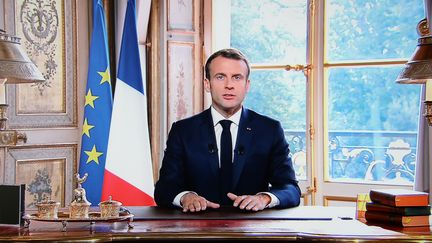 Emmanuel Macron, président de la République, lors d'une allocution télévisée, le 4 novembre 2018, à l'Elysée. (LUDOVIC MARIN / AFP)