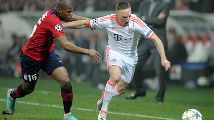 Piszczek (Dortmund) et Ribéry (Bayern Munich) à la lutte (DENIS CHARLET / AFP)