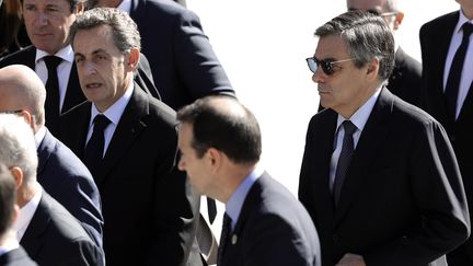 Nicolas Sarkozy et François Fillon, le 15 octobre 2016, à Nice. (VALERY HACHE / AFP)