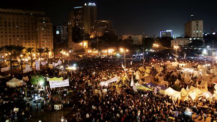 Plusieurs milliers de manifestants &eacute;taient r&eacute;unis, mardi 4 d&eacute;cembre, place Tahrir au Caire (Egypte), pour protester contre la d&eacute;rive autoritaire du pr&eacute;sident Mohamed Morsi. (MAYA ALLERUZZO / AP / SIPA)