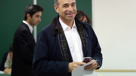 Le pr&eacute;sident de l'UMP, Jean-Fran&ccedil;ois Cop&eacute;, lors du premier tour des &eacute;lections municipales, &agrave; Meaux (Seine-et-Marne), le dimanche 23 mars 2014. (KENZO TRIBOUILLARD / AFP)