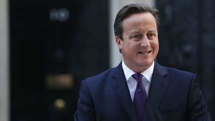 &nbsp; (David Cameron, soulagé, ce vendredi matin, devant le 10 Downing street, à Londres. © REUTERS/Suzanne Plunkett)