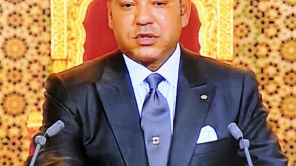 Le roi Mohammed VI, à la télévision marocaine le 30 juillet 2010. (AFP PHOTO/ABDELHAK SENNA)