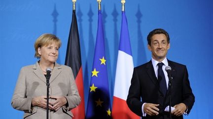 Angela Merkel et Nicolas Sarkozy, le 18 octobre 2010 à Deauville. (AFP - Franck Fife)