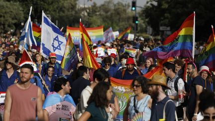 Des participants à la 18e Marche des fiertés de Jérusalem, le 3 juin 2021. (MENAHEM KAHANA / AFP)