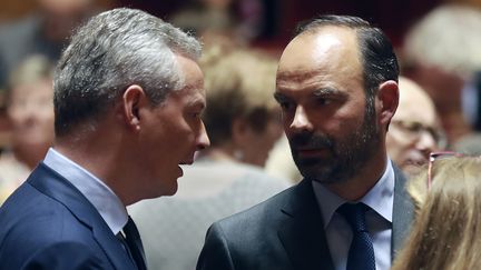 Le ministre de l'économie, Bruno Le Maire et&nbsp;le premier ministre, Edouard Philippe le 6 juillet 2017 au Sénat. (JACQUES DEMARTHON / AFP)