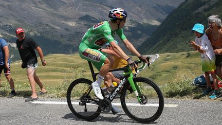 Wout van Aert (Jumbo-Visma) et son maillot vert sur le Tour de France, le 13 juillet 2022, lors de la 11e étape. (LAURENT LAIRYS / DPPI via AFP)
