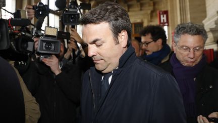 Thomas Thévenoud à son arrivée au Palais de justice de Paris, le 19 avril 2017. (PATRICK KOVARIK / AFP)