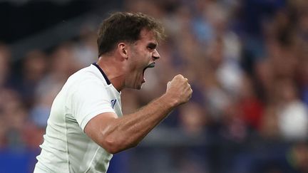 Damian Penaud laisse exploser sa joie après avoir inscrit son 30e essai sous le maillot bleu contre la Nouvelle-Zélande, en ouverture de la Coupe du monde, le 8 septembre 2023. (FRANCK FIFE / AFP)