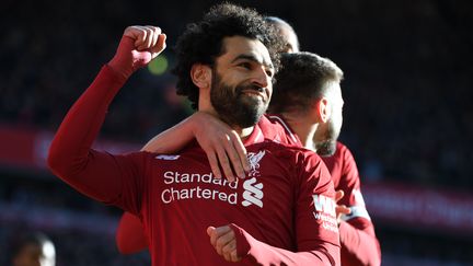 Le footballeur Mohamed Salah sur la pelouse de son club de Liverpool, le 27 octobre 2018.&nbsp; (PAUL ELLIS / AFP)