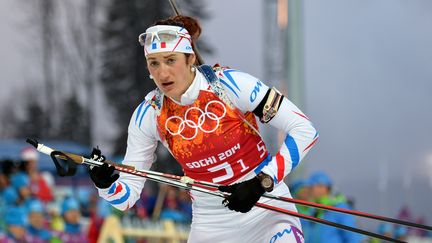 La Fran&ccedil;aise Marie-Laure Brunet pendant l'&eacute;preuve de relais biathlon 4x6 km, aux JO de Sotchi, vendredi 21 f&eacute;vrier 2014.&nbsp; (ALBERTO PIZZOLI / AFP)