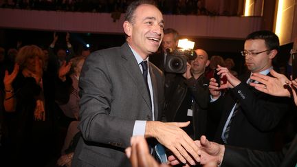 Le pr&eacute;sident de l'UMP, Jean-Fran&ccedil;ois Cop&eacute;, arrive au colloque des Amis de Nicolas Sarkozy, le 20 f&eacute;vrier 2013 &agrave; Paris. (MAXPPP)