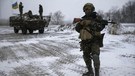 &nbsp; (Les combats se poursuivent à Debaltseve, malgré le cessez-le-feu © Reuters-Gleb Garanich)