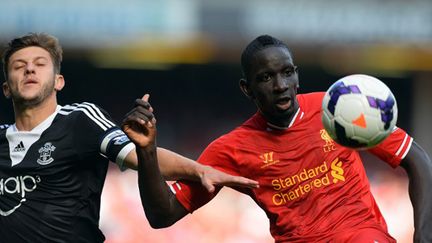 Adam Lallana (à gauche) et Mamadou Sakho (PAUL ELLIS / AFP)