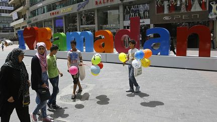 &nbsp; (Des vendeurs de ballons pendant le Ramadan © SIPA)