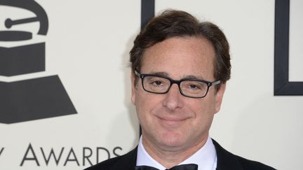 L'acteur américain Bob Saget arrive aux Grammy Awards, à Los Angeles (Californie, Etats-Unis), le 26 janvier 2014. (ROBYN BECK / AFP)