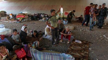 Des réfugiés Yezidis ont été accueillis dans la ville kurde de Duhok, au nord de Mossoul. (Ahmad al-Rubaye/AFP)