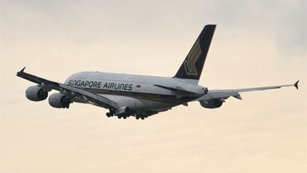 Un A380 de Singapore Airlines au décollage à l'aéroport de Singapour (AFP - ROSLAN RAHMAN)