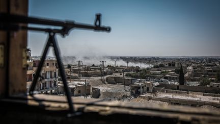 Vue générale du quartier d'Al-Dariya, à Raqqa (Syrie), le 24 juillet 2017. (MORUKC UMNABER / DPA / AFP)