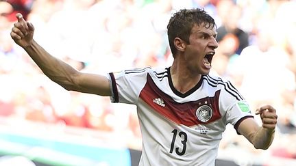 L'Allemand Thomas M&uuml;ller exulte apr&egrave;s son deuxi&egrave;me but (sur trois) face au Portugal, lors de la Coupe du monde, &agrave; Salvador de Bahia, le 16 juin 2014. (REUTEURS / DYLAN MARTINEZ)