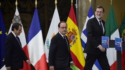 Le président chypriote Nicos Anastasiades (à gauche), François Hollande (au centre), le Premier ministre espagnol Mariano Rajoy (à droite), au palais du Pardo, à Madrid, lundi 10 avril. (PIERRE-PHILIPPE MARCOU / AFP)