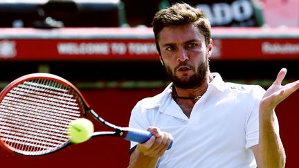 Gilles Simon continue l'aventure à Tokyo (TOSHIFUMI KITAMURA / AFP)