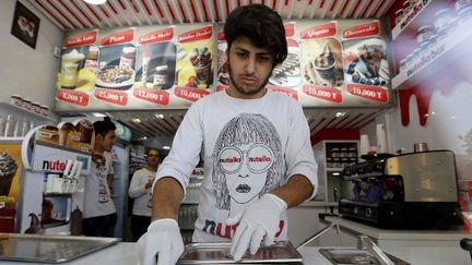 Les Nutella Bars poussent comme des champignons à Téhéran. (ATTA KENARE / AFP)